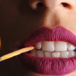 woman with lighted match graphic wallpaper